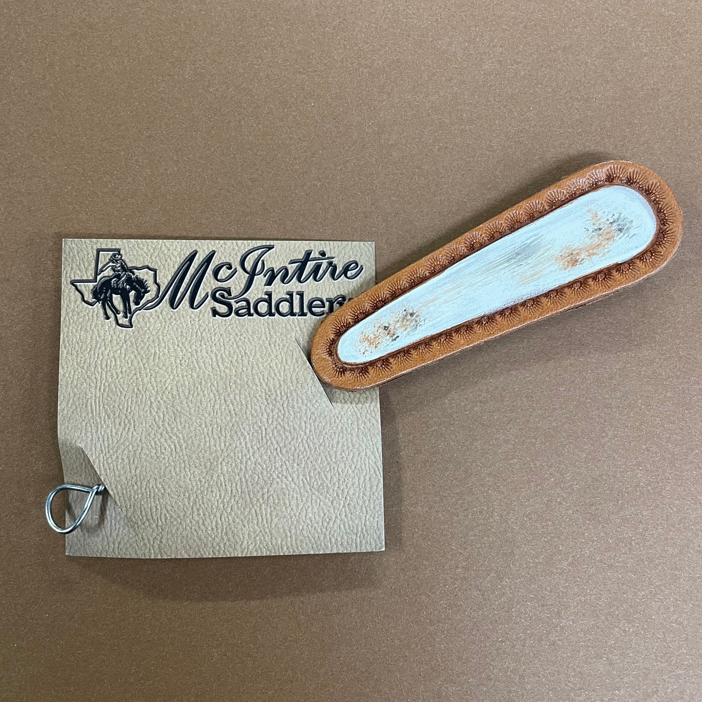 White Buffalo Oval Hat Pick- McIntire Saddlery